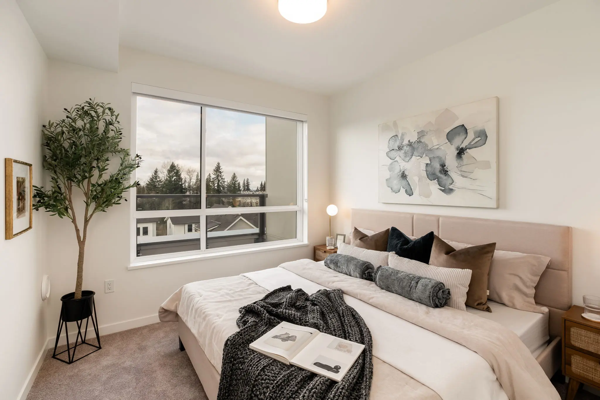 Bedroom at The Hive 2 in Willoughby, Langley with a large window looking out to trees